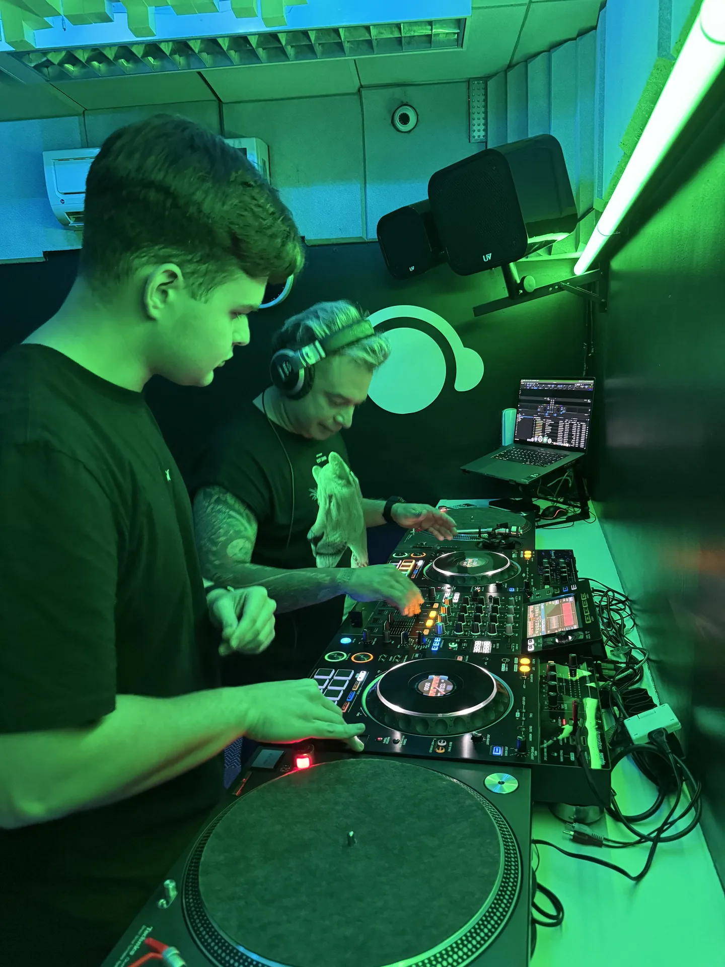 Studio 5 · DJ Ban EMC · XDJ-RX3 · two students · turntable · green LED
