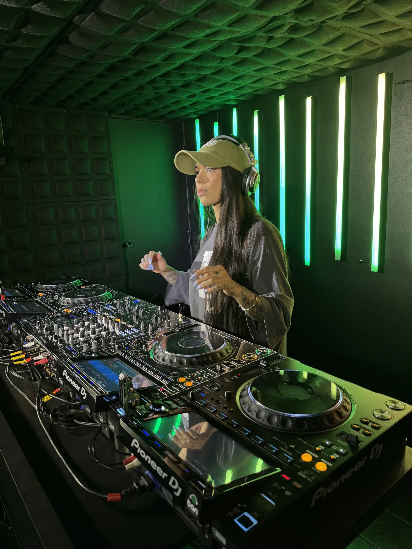 Studio 7 · DJ Ban EMC · Student DJ · Pioneer DJ setup · green LED lighting